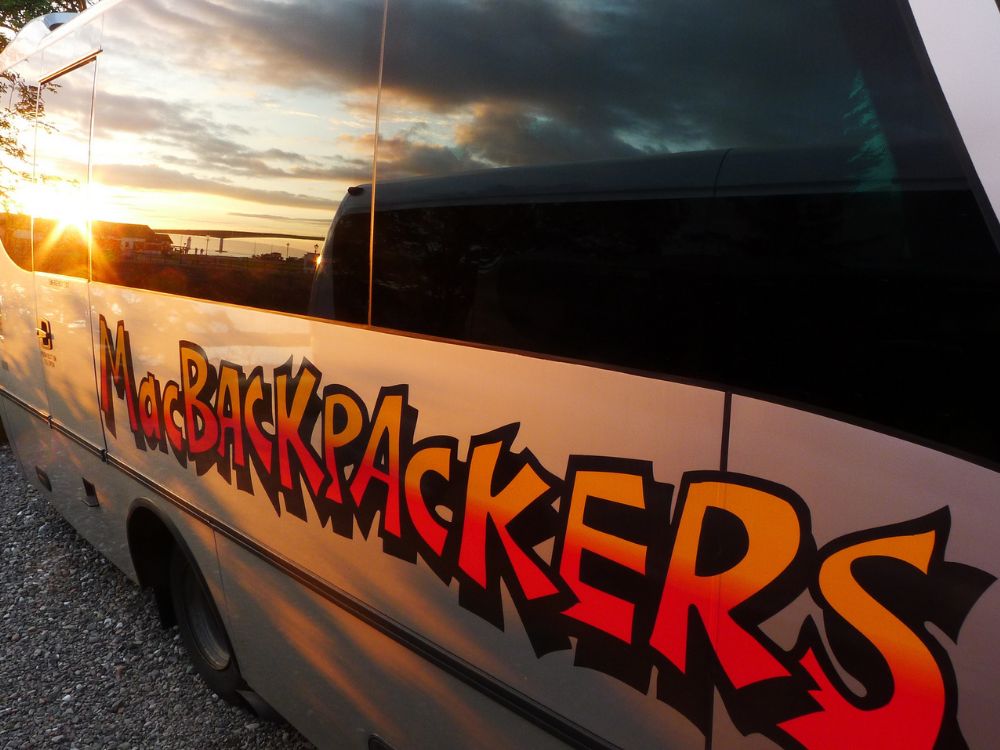 Side of MacBackpackers Bus