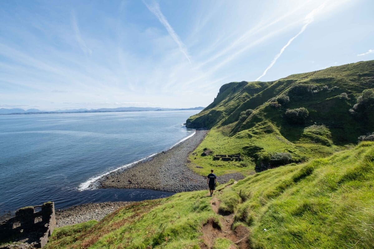 Overlooking the sea and cliffs on the isle of skye, Scotland adventure tours, connection with nature, solo traveller, safe solo travel, guided backpacking tour, the best scottish highlands tour